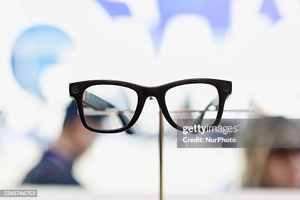 Close-up of the Ray-Ban Meta Wayfarer smart glasses in Shiny Black is displayed at the Meta booth in Hall 4, showcasing the fusion of iconic eyewear...