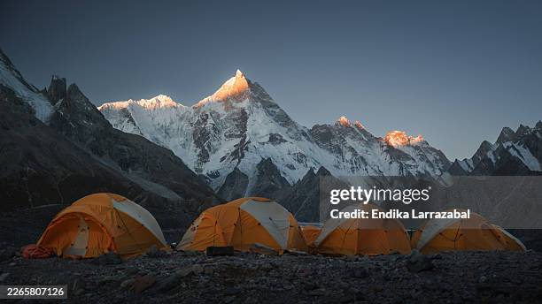 camping tents at masherbrum base camp in karakoram mountains. karakoram - base camp stock pictures, royalty-free photos & images