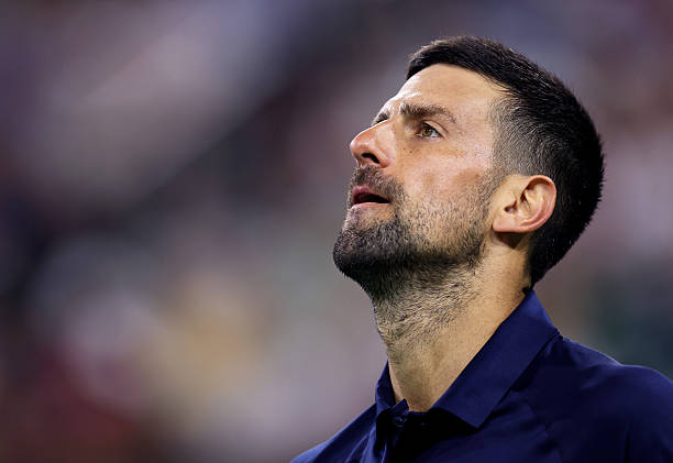 Novak Djokovic of Serbia shows his dejection against Jack Draper of Great Britain in their fourth round match of the BNP Paribas Open at Indian Wells...