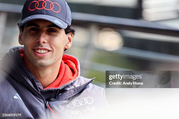 Gabriel Bortoleto of Brazil and Audi F1 Team looks on in the Paddock during previews ahead of the F1 Grand Prix of China at Shanghai International...
