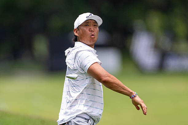 Anthony Kim of 4AcesGC reacts after playing his approach on hole 15 during day one of LIV Golf Singapore at Sentosa Golf Club on March 12, 2026 in...