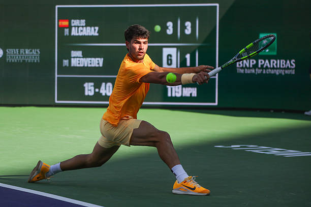 Carlos Alcaraz hits a backhand during the BNP Paribas Open on March 14, 2026 at Indian Wells Tennis Garden in Indian Wells, CA.