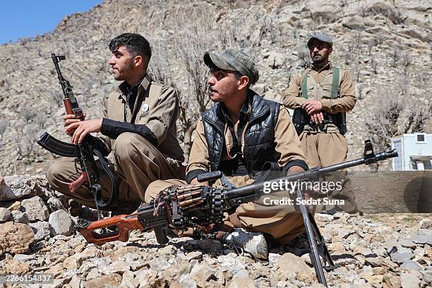 Members of Komala of the Toilers of Kurdistan, a Kurdish Iranian dissident group, are seen at their military bases hidden among the mountains on...