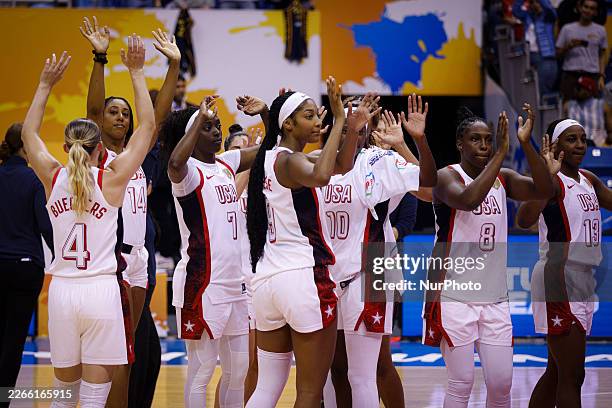 Women's National Team players celebrate their win during the game at the 2026 FIBA World Cup Qualifying Tournament between the United States and...