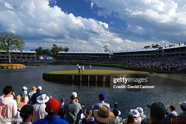 General View as Matt Fitzpatrick of England putts on the 17th green during the final round of THE PLAYERS Championship 2026 at THE PLAYERS Stadium...