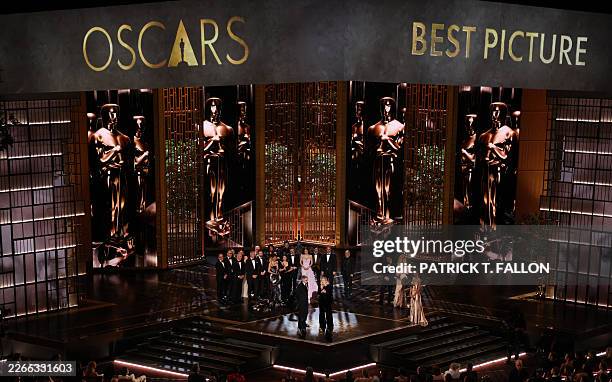 Filmmaker Paul Thomas Anderson and US producer Sara Murphy accept the award for Best Picture for "One Battle After Another" alongside cast and crew...