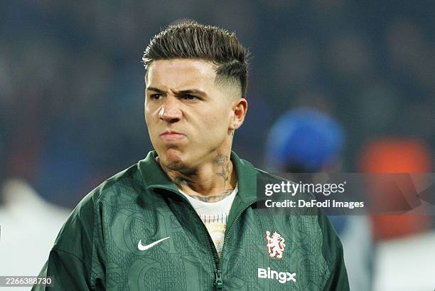 Paris, France Enzo Fernandez of Chelsea looks on during the UEFA Champions League 2025/26 Round of 16 First Leg match between Paris Saint-Germain FC...