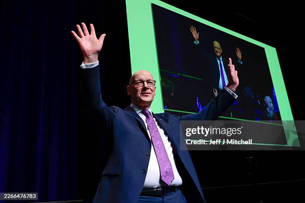 First Minister and SNP leader John Swinney acknowledges applause after addressing the SNP campaign Conference at Edinburgh International Conference...