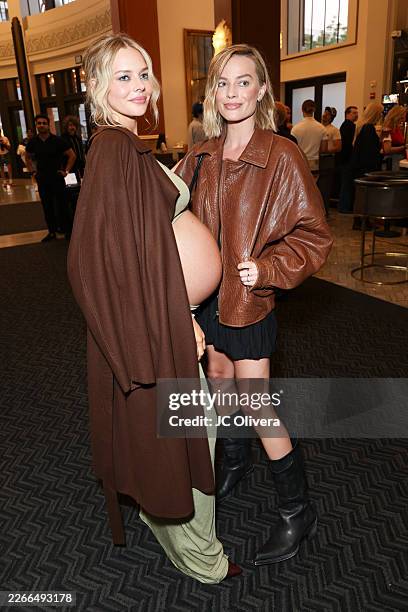 Samara Weaving and Margot Robbie at the "Ready or Not 2: Here I Come" Los Angeles Screening held at AMC The Grove 14 on March 16, 2026 in Los...