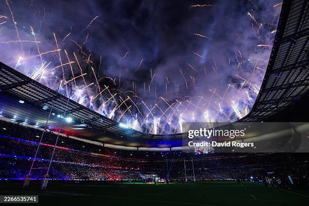 General view as players of France celebrate as Antoine Dupont of France lifts the Six Nations trophy, after defeating England, following the Guinness...