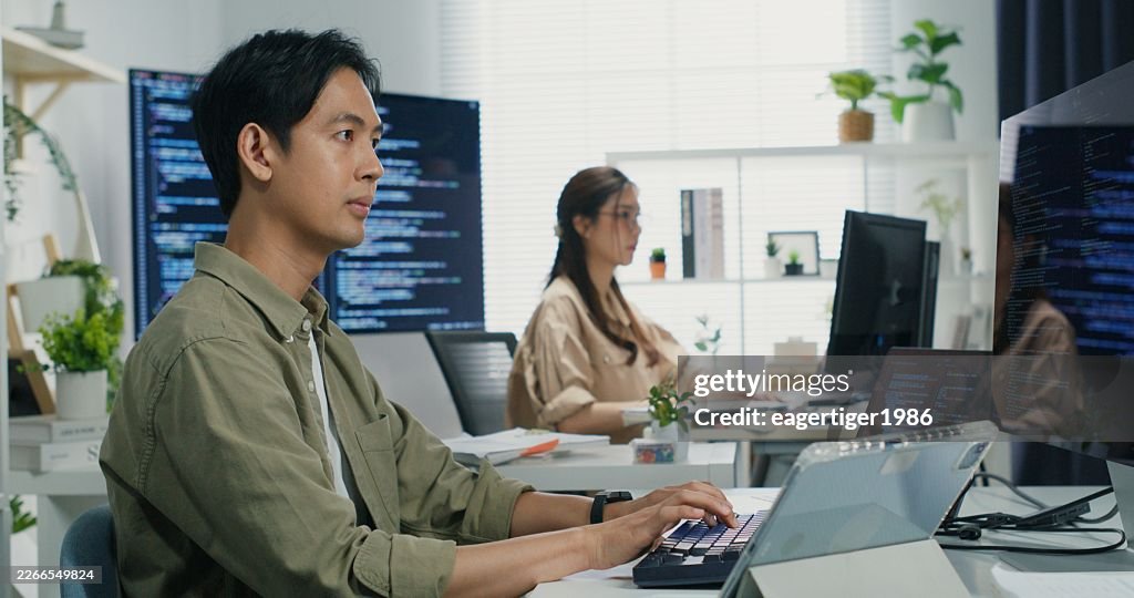 Asian Engineer Pair Coding.