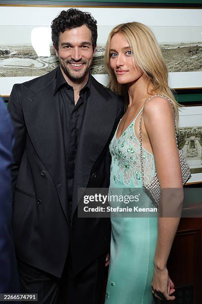 Paul Anthony Kelly and Sarah Pidgeon, wearing CHANEL, attend the CHANEL and Charles Finch Annual Pre-Oscar Dinner at the Polo Lounge at The Beverly...