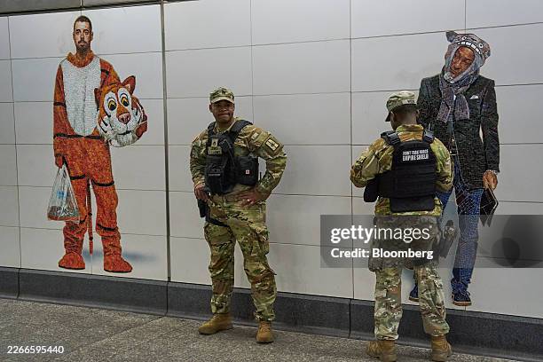 New York Army National Guard soldiers, part of Joint Task Force Empire Shield, at the 72nd Street-Second Avenue subway station in New York, US, on...