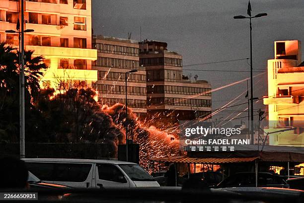 Fireball rises from the site of an Israeli airstrike that targeted a building in Beirut's Bashoura neighbourhood early on March 18, 2026. Lebanon was...