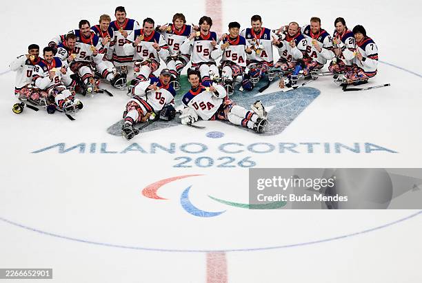 Gold medallists, Team United States pose for a photo during the medal ceremony for the Para Ice Hockey Open Team Tournament on day nine of the Milano...