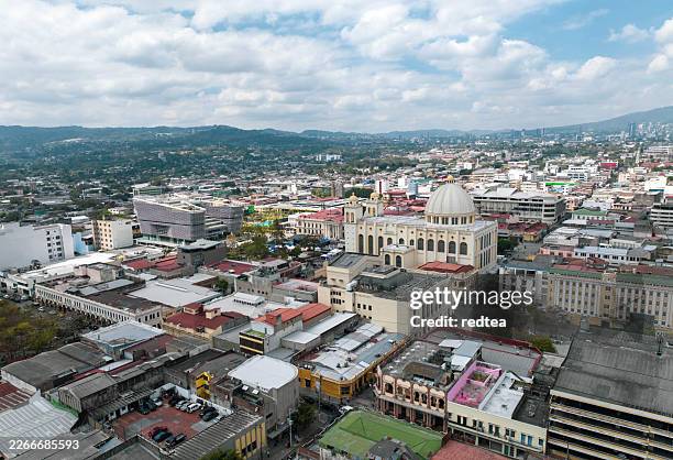 aerial view of san salvador cityscape featuring metropolitan cathedral, el salvador - san salvador stock pictures, royalty-free photos & images