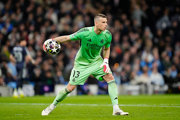 Andriy Lunin goalkeeper of Real Madrid and Ukraine during the UEFA Champions League 2025/26 Round of 16 Second Leg match between Manchester City FC...