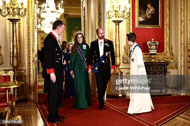 Sir Timothy Lawrence, Catherine Princess of Wales Prince William, Prince of Wales and Princess Anne, Princess Royal arrive to attend a State Banquet...
