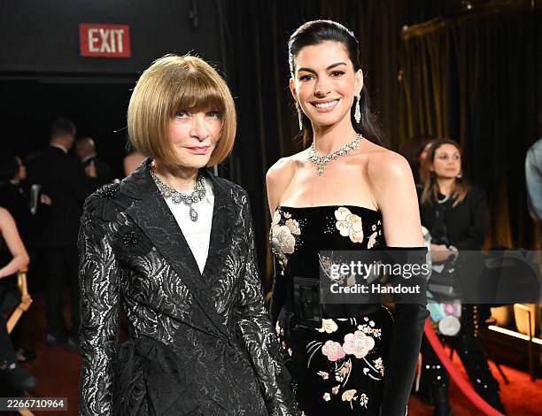 In this handout photo provided by The Academy, Anna Wintour and Anne Hathaway pose backstage during the 98th Oscars at Dolby Theatre on March 15,...
