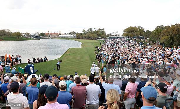 Cameron Young of the United States tee's off at the 18th during the final round of THE PLAYERS Championship 2026 at THE PLAYERS Stadium course at TPC...