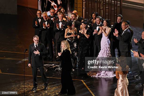 Paul Thomas Anderson and Sara Murphy with cast and crew accept the Best Picture award for "One Battle After Another" onstage during the 98th Oscars...
