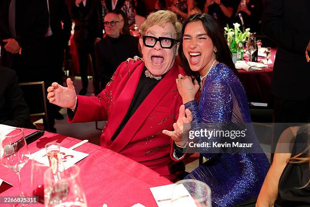 Elton John and Dua Lipa attend Elton John AIDS Foundation's 34th Annual Academy Awards Viewing Party on March 15, 2026 in West Hollywood, California.