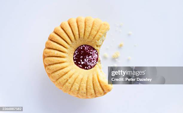 generic cookie on white plate. - missing bite stock pictures, royalty-free photos & images