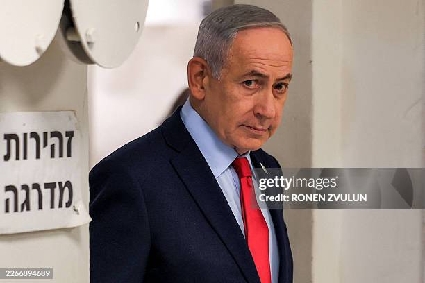 Israeli Prime Minister Benjamin Netanyahu arrives for a press conference in Jerusalem on March 19, 2026. Netanyahu said on March 19 that Israel and...