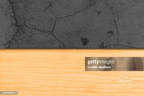 abstract halved vector background with top half dark gray black cracked old weathered rustic run down wall and bottom part wooden textured beige brown - rustic interior stock illustrations