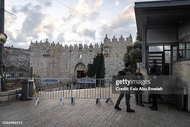 Damascus Gate, one of the gates of the Old City of Jerusalem, is closed with iron barriers, and the Israeli police are preventing anyone who does not...