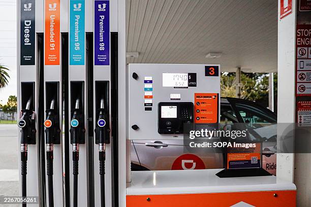 Petrol pumps are seen at a self service fuel station. Fuel prices in Australia remain elevated amid global tensions involving the United States,...