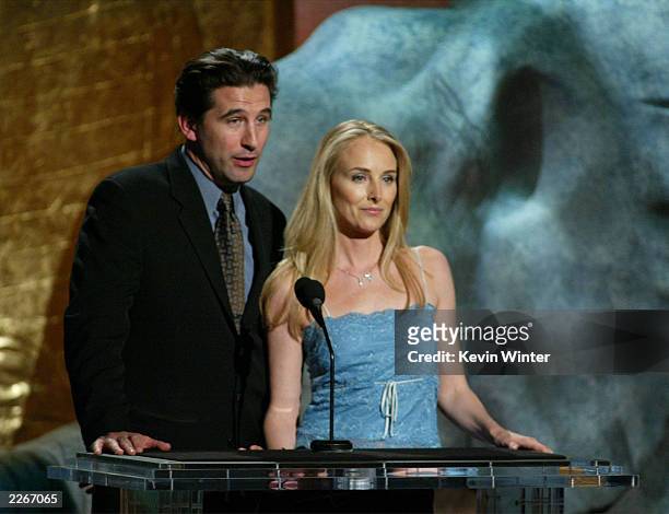 Actor William Baldwin and wife Chynna Phillips-Baldwin speak on stage during the 17th Annual Genesis Awards at the Beverly Hilton Hotel on March 15,...