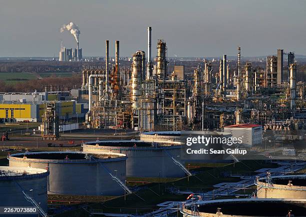 In this aerial view the Leuna industrial chemical park stands as exhaust rises from the Kraftwerk Schkopau coal-fired power plant behind on March 17,...