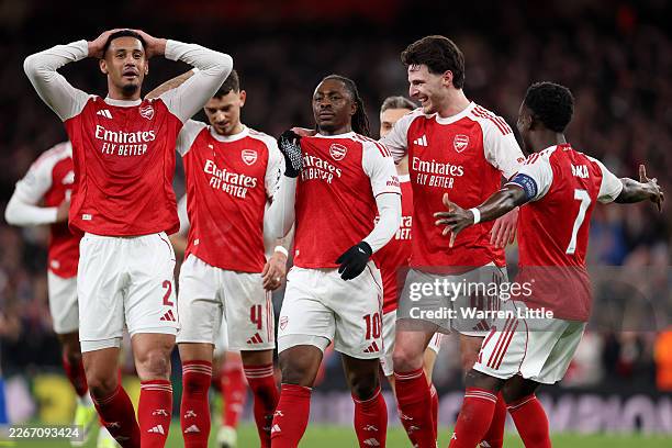 Eberechi Eze of Arsenal celebrates scoring his team's first goal with teammates during the UEFA Champions League 2025/26 Round of 16 Second Leg match...