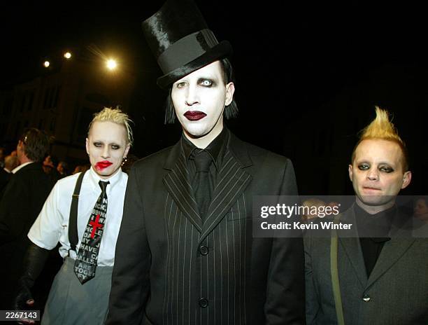 Rock star Marilyn Manson with his band, Tim Skold and Pogo arrive at a screening of "Final Flight of the Osiris", a CG animated short, and a party to...