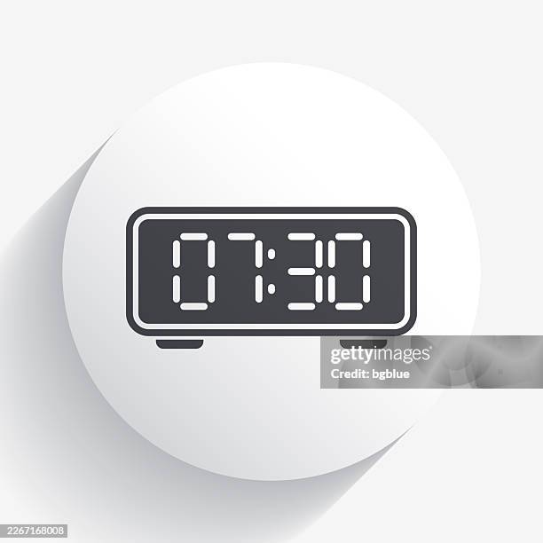 digital clock. icon on circle button with long shadow - digital clock white background stock illustrations