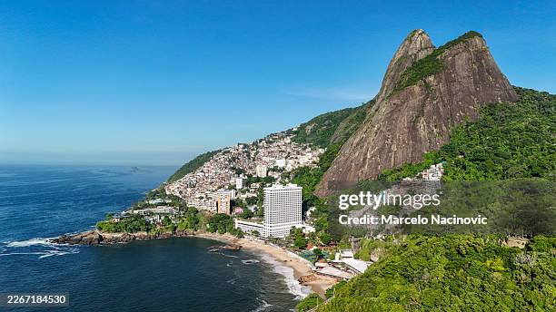 vidigal beach and morro dois irmãos in rio de janeiro - slum stock pictures, royalty-free photos & images