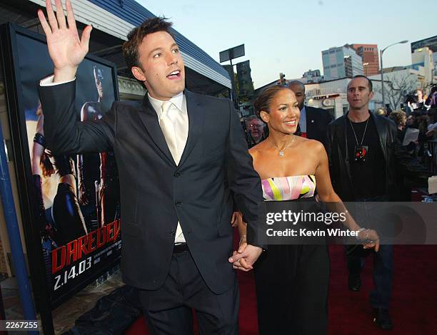 Actor Ben Affleck and his fiance actress/singer Jennifer Lopez arrive at the premiere of "Daredevil" at the Village Theatre on February 9, 2003 in...