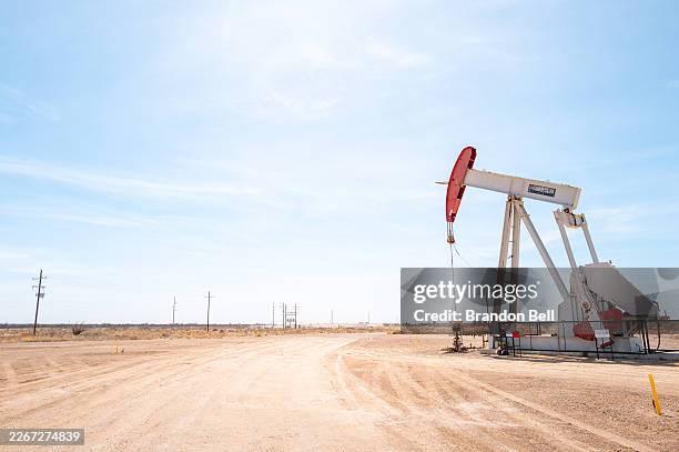 Pump jack is seen in a field on March 18, 2026 in Pecos, Texas. Oil prices have risen roughly 4% as the recent conflict involving Iran, the United...