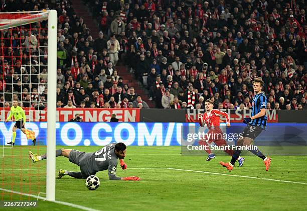 Lennart Karl of FC Bayern Munich scores his team's third goal during the UEFA Champions League 2025/26 Round of 16 Second Leg match between FC Bayern...