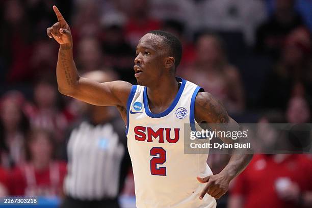 Boopie Miller of the SMU Mustangs celebrates during the first half against the Miami RedHawks in the First Four game of the 2026 NCAA Men's...
