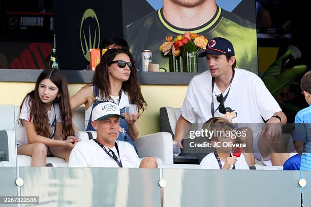 Mila Kunis and Ashton Kutcher at the Fanatics Flag Football Classic held at BMO Stadium on March 21, 2026 in Los Angeles, California.