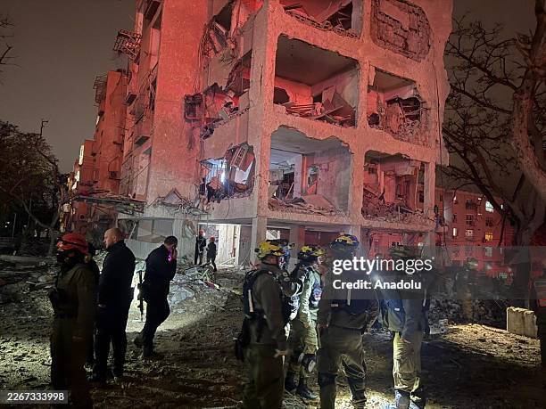View from the scene shows destruction to buildings following two consecutive retaliatory strikes by Iran targeting Israel's southern region,...
