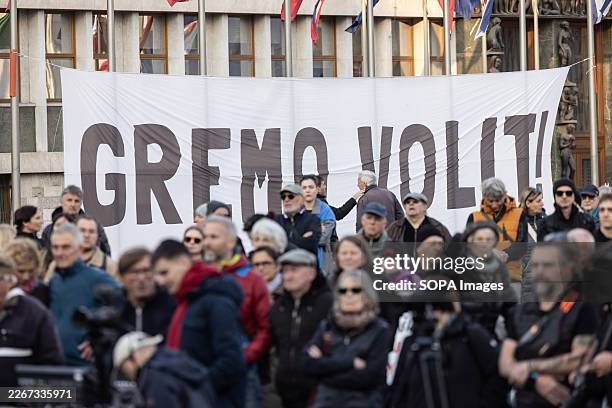 Banner that reads Go vote! hangs in front of the Slovenian Parliament during a rally urging citizens to vote. The parliamentary elections in Slovenia...