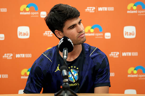 Carlos Alcaraz of Spain fields questions from the media on Day 3 of the Miami Open Presented by Itau at Hard Rock Stadium on March 19, 2026 in Miami...
