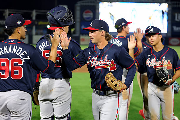 The Atlanta Braves celebrate winning the game between the Atlanta Braves and the New York Yankees at George M. Steinbrenner Field on Saturday, March...
