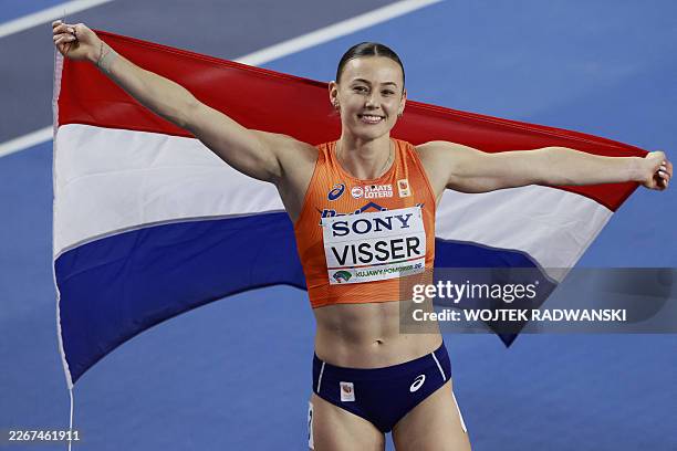 Second placed Netherlands' Nadine Visser celebrates after competing in the women's final 60 metres hurdles event during the World Athletics Indoor...