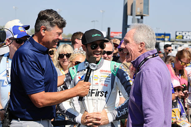 Michael Waltrip and his brother Darrell Waltrip interview Chase Elliott prior to the running of the NASCAR Cup Series Goodyear 400 on March 22, 2026...