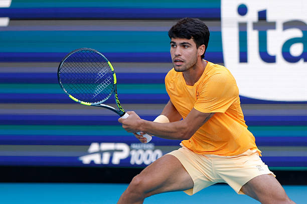 Carlos Alcaraz in action during his men's third round singles match against Sebastian Korda at the Miami Open on March 22 at Hard Rock Stadium in...
