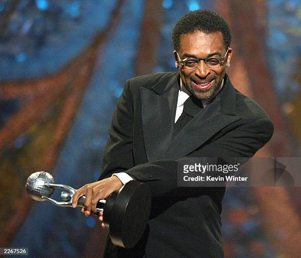 Director Spike Lee gestures as he receives the Hall of Fame Award while attending "The 34th NAACP Image Awards" at the Universal Amphitheater March...